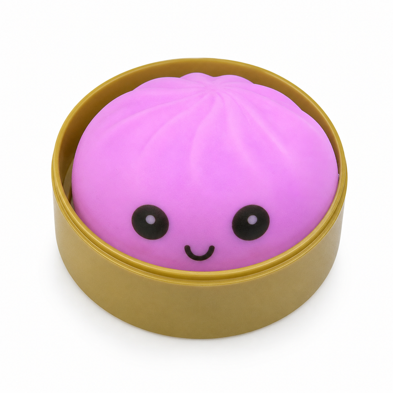 Pink bun-shaped stress reliever toy with a smiling face in a brown container on a white background
