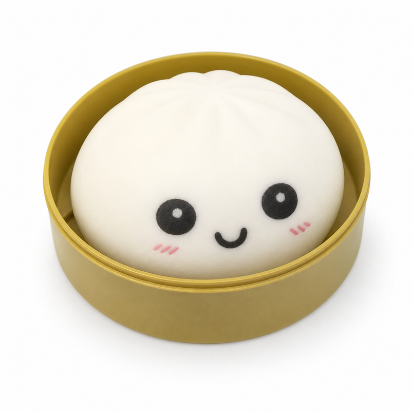 White round pastry with a face in a yellow container on a white background