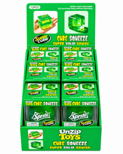 Display of 'Cube Squeeze' products by Unzip Toys with green packaging. – thumbnail