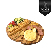 Wooden charcuterie board with assorted foods on a white background, featuring the Ronis brand. – thumbnail