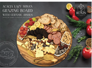 Grazing board with various foods and ceramic dishes on a dark surface, featuring the RONIS Signature Homewares – thumbnail