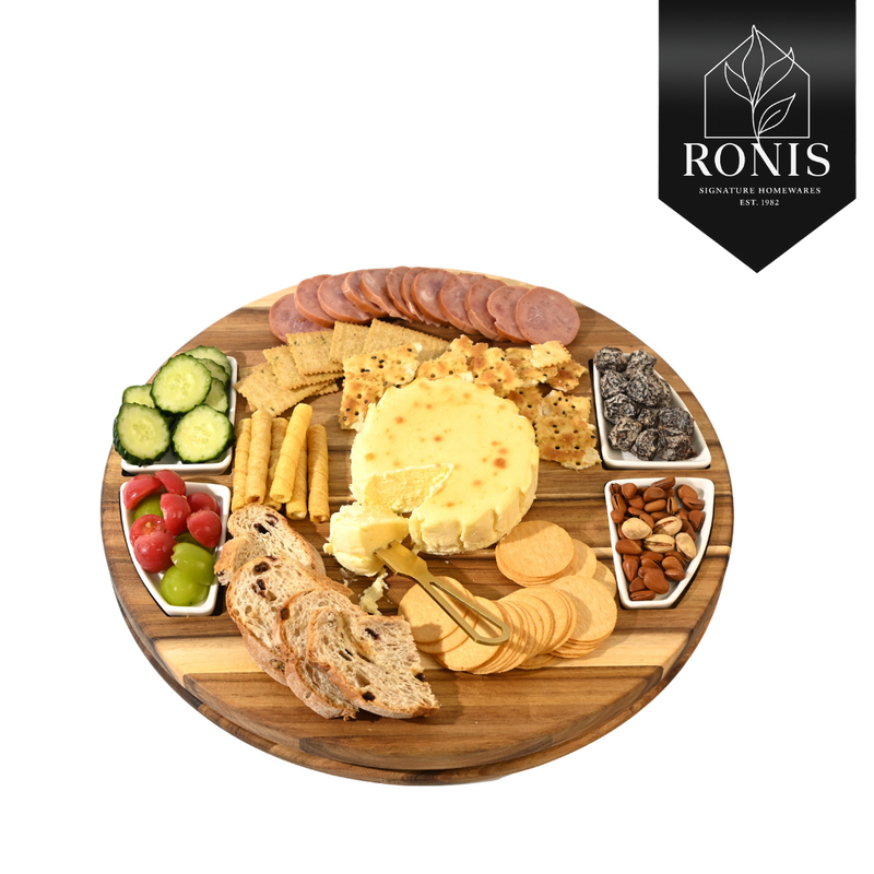 Wooden charcuterie board with assorted foods on a white background, featuring the Ronis Signature Homeware brand.