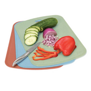 cutting boards with vegetables and a knife – thumbnail