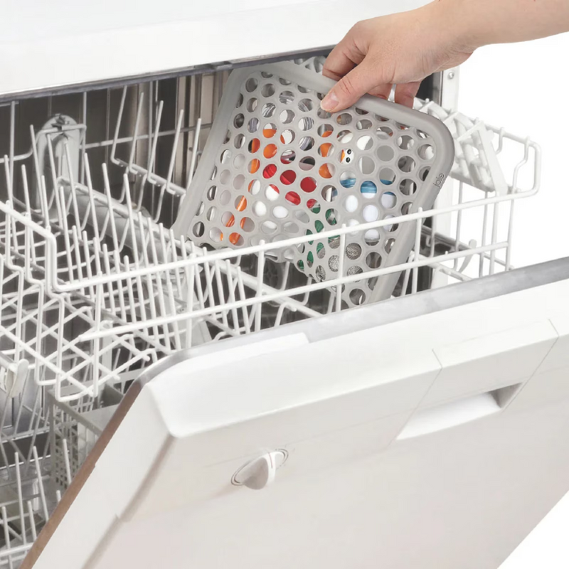 dish rack into an open dishwasher.
