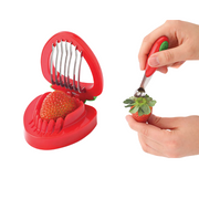 Joie Strawberry Hull and Slice Tool with stainless steel claw and built-in slicer, ideal for prepping fresh strawberries quickly