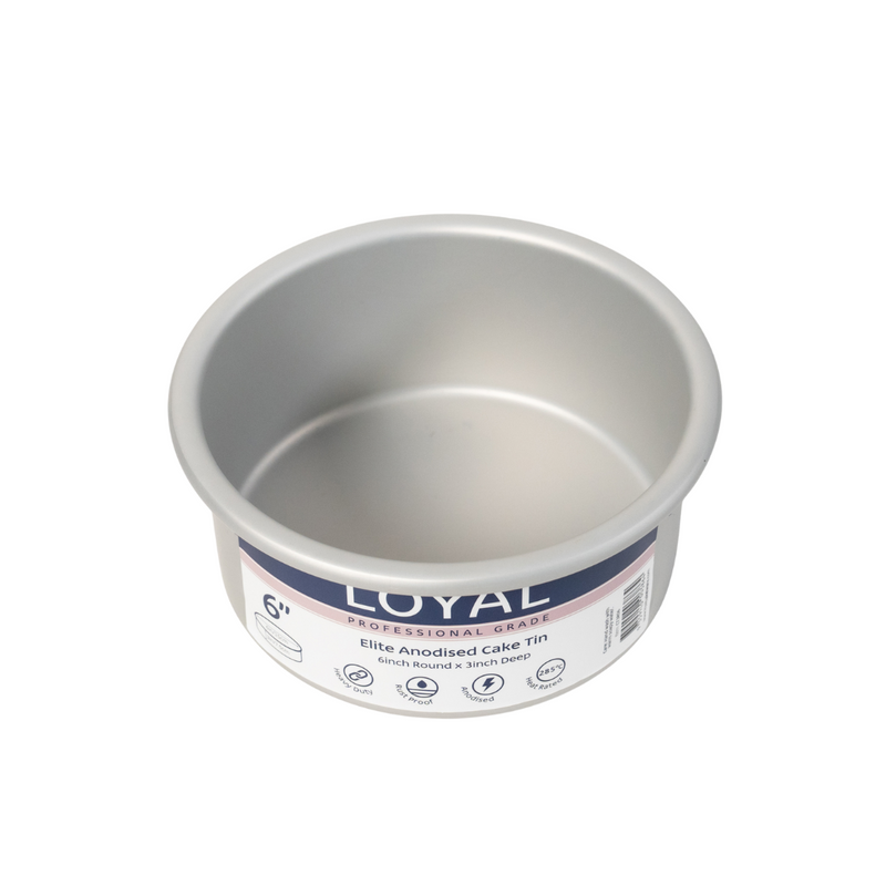 Metal cake pan with 'Loyal' branding on a white background