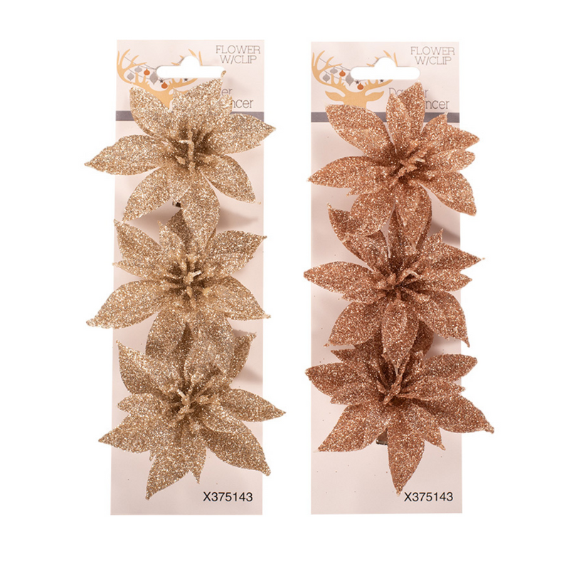 poinsettia ornaments in rose gold and champagne with attached clips, ideal for Christmas trees, garlands, or wreaths.